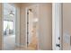 View of hallway showcasing an open bedroom and bathroom at 2500 S Zephyr Ave, Pahrump, NV 89048
