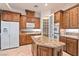 This bright kitchen includes custom cabinets, granite counters, stainless appliances, and a spacious pantry at 2500 S Zephyr Ave, Pahrump, NV 89048