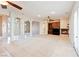 Spacious open-concept living room with a fireplace and French doors at 2500 S Zephyr Ave, Pahrump, NV 89048