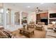 Comfortable living room featuring a fireplace, built-ins, and plush seating at 2500 S Zephyr Ave, Pahrump, NV 89048
