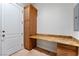Conveniently located office nook with built-in desk, storage cabinets, and drawers at 2500 S Zephyr Ave, Pahrump, NV 89048