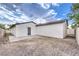 Large backyard area with a concrete patio and dirt at 2536 Herrod Dr, North Las Vegas, NV 89030