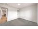 Bedroom offers neutral carpet and is naturally lit at 2536 Herrod Dr, North Las Vegas, NV 89030