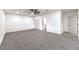 Spacious bedroom with neutral carpet, large closet, and ample natural light at 2536 Herrod Dr, North Las Vegas, NV 89030