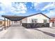 Single-story home featuring an attached carport and gravel landscaping at 2536 Herrod Dr, North Las Vegas, NV 89030
