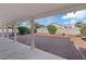 Covered backyard patio with views of the landscaped yard and surrounding neighborhood at 272 Violet Note St, Henderson, NV 89074