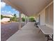 Spacious covered backyard patio ideal for outdoor dining and entertaining with views of the landscaped yard at 272 Violet Note St, Henderson, NV 89074