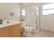 Clean bathroom featuring tiled floors and a glass-enclosed shower at 272 Violet Note St, Henderson, NV 89074