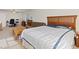 Spacious bedroom with a large bed, seating, and a comfortable work area at 272 Violet Note St, Henderson, NV 89074
