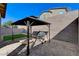 Backyard featuring gazebo over patio. Small artificial turf grass area at 2796 Sipe Springs St, Las Vegas, NV 89142