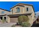 Two story home featuring two car garage and well maintained landscaping at 2796 Sipe Springs St, Las Vegas, NV 89142