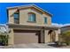 Two story home with two car garage and arched front door entry at 2796 Sipe Springs St, Las Vegas, NV 89142