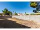 Fenced backyard space filled with decorative gravel landscaping at 2805 Rungsted St, Las Vegas, NV 89142