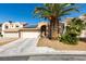 Home exterior showcasing a drought-tolerant landscaped front yard at 2805 Rungsted St, Las Vegas, NV 89142