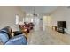 Bright living area showcases tile floors, dining area, and natural light at 2805 Rungsted St, Las Vegas, NV 89142