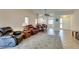 Spacious living area with tile floors flows into dining area and adjacent kitchen at 2805 Rungsted St, Las Vegas, NV 89142