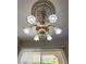 Ornate chandelier adds an elegant touch to the dining space at 2809 Winslow Springs Dr, Henderson, NV 89052