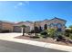 Charming single-story home featuring a tile roof and well-maintained desert landscaping at 2809 Winslow Springs Dr, Henderson, NV 89052