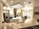 Bright kitchen featuring a large island, stainless steel appliances, and modern design, perfect for cooking at 2809 Winslow Springs Dr, Henderson, NV 89052