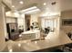 Well-appointed kitchen featuring a center island, stainless steel appliances, breakfast bar, and ample storage space at 2809 Winslow Springs Dr, Henderson, NV 89052
