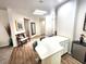 Bright kitchenette area with bar seating and seamless flow to other rooms at 2809 Winslow Springs Dr, Henderson, NV 89052