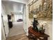View through doorway to open living area with a comfortable couch and carpeted floors at 2809 Winslow Springs Dr, Henderson, NV 89052