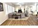 Comfortable living room with neutral tones and natural light from shuttered windows at 2809 Winslow Springs Dr, Henderson, NV 89052