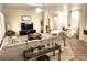 Open living room with modern decor and easy access to the kitchen area at 2809 Winslow Springs Dr, Henderson, NV 89052