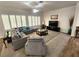 Cozy living room features comfortable seating, ample natural light, and stylish décor at 2809 Winslow Springs Dr, Henderson, NV 89052