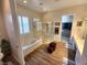 Main bathroom featuring a glass shower, soaking tub, double sinks, and walk-in closet at 2809 Winslow Springs Dr, Henderson, NV 89052