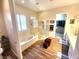 Main bathroom featuring modern soaking tub, walk-in shower, and stylish tile flooring at 2809 Winslow Springs Dr, Henderson, NV 89052