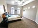 Large bedroom features plush carpet and lots of natural light with fan and recessed lights at 2809 Winslow Springs Dr, Henderson, NV 89052