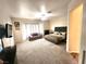 Spacious main bedroom offering a tranquil retreat with large windows and plush seating area at 2809 Winslow Springs Dr, Henderson, NV 89052