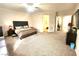 Large main bedroom featuring a comfortable bed, ample closet space, and a soothing ambiance at 2809 Winslow Springs Dr, Henderson, NV 89052