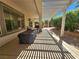 Enjoy outdoor living on this covered patio with desert landscaping and room for grilling at 2809 Winslow Springs Dr, Henderson, NV 89052