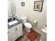 Charming powder room with modern vanity, gray countertop, and stylish fixtures at 2809 Winslow Springs Dr, Henderson, NV 89052