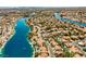 Expansive aerial shot showcasing the waterfront homes and interconnected canals of the community at 2909 Sterling Cove Dr, Las Vegas, NV 89128