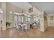Dining area with vaulted ceilings, modern decor, and ample space for entertaining at 2909 Sterling Cove Dr, Las Vegas, NV 89128