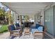 Covered patio with outdoor seating area and dining table, perfect for entertaining at 2909 Sterling Cove Dr, Las Vegas, NV 89128