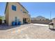 The backyard features a large concrete pad, a covered patio, and potential for landscaping at 2951 Overlook Brook St, Las Vegas, NV 89156
