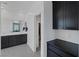 Bathroom with a double vanity and a closet nearby gives a modern feel at 2951 Overlook Brook St, Las Vegas, NV 89156