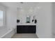 Bathroom features a soaking tub, a double sink vanity, and modern finishes at 2951 Overlook Brook St, Las Vegas, NV 89156