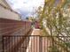 View of backyard with fence, desert landscaping and vegetation along with a rock pathway at 3024 Nutwood St, Las Vegas, NV 89108