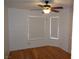 Bedroom with a ceiling fan and two windows at 3024 Nutwood St, Las Vegas, NV 89108