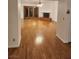 Spacious living room with hardwood floors, fireplace, and large French doors offering natural light at 3024 Nutwood St, Las Vegas, NV 89108