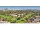 Stunning aerial view overlooking a lush green golf course and the Las Vegas skyline at 3111 Bel Air Dr # 18B, Las Vegas, NV 89109