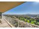 Expansive balcony overlooks the city with mountain views in the distance at 3111 Bel Air Dr # 18B, Las Vegas, NV 89109