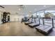 Well-equipped fitness center with treadmills, weights, and large windows at 3111 Bel Air Dr # 18B, Las Vegas, NV 89109