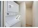 Convenient, space-saving stacked washer and dryer in a dedicated laundry area at 3111 Bel Air Dr # 18B, Las Vegas, NV 89109