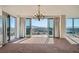 Bright living room with balcony access and sweeping city views at 3111 Bel Air Dr # 18B, Las Vegas, NV 89109